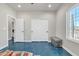 Bedroom with an ensuite laundry room, a large closet, and a scenic view from the window at 4188 N Plaza Dr, Apache Junction, AZ 85120