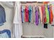 Organized walk-in closet with clothes, shoes, and storage solutions for optimal use at 4188 N Plaza Dr, Apache Junction, AZ 85120