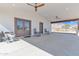 Relaxing covered patio with ceiling fans, offering a tranquil outdoor space at 4188 N Plaza Dr, Apache Junction, AZ 85120