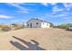 Wide angle of home and desert landscape with truck and trailers in the background at 4188 N Plaza Dr, Apache Junction, AZ 85120