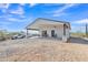 Inviting home with a spacious covered patio, complemented by the desert landscape at 4188 N Plaza Dr, Apache Junction, AZ 85120