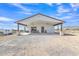 Captivating home featuring a large covered patio with ceiling fans and desert views at 4188 N Plaza Dr, Apache Junction, AZ 85120