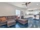 A spacious living room that leads to the kitchen and is filled with natural light at 4188 N Plaza Dr, Apache Junction, AZ 85120