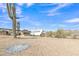 Expansive property with desert landscape and horse trailer at 4188 N Plaza Dr, Apache Junction, AZ 85120