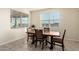 Cozy dining area bathed in natural light with seating for four at 4459 E Warlander Ln, San Tan Valley, AZ 85140