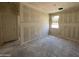 Bedroom featuring drywall installed with a window letting in lots of natural light at 46886 W Old Timer Rd, Maricopa, AZ 85139