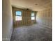 Bedroom shows drywall installed with large windows allowing plenty of natural light at 46886 W Old Timer Rd, Maricopa, AZ 85139