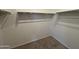 Open walk-in closet featuring shelving and bars for optimal storage at 46886 W Old Timer Rd, Maricopa, AZ 85139