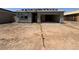 An exterior elevation shows a home under construction with an open garage and neutral color scheme at 46886 W Old Timer Rd, Maricopa, AZ 85139
