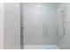 Tiled shower with a glass enclosure and modern fixtures, offering a sleek design at 475 S Soho Ln # 35, Chandler, AZ 85225