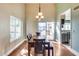 Bright dining room with natural light and access to the outdoor pool area at 5915 E Fairfield St, Mesa, AZ 85205