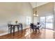 Dining room with hardwood floors, large windows and access to the pool at 5915 E Fairfield St, Mesa, AZ 85205