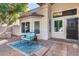 Inviting entrance with seating, large windows and walkway at 5915 E Fairfield St, Mesa, AZ 85205