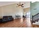 Spacious living room with high ceilings and a ceiling fan, perfect for entertaining guests at 5915 E Fairfield St, Mesa, AZ 85205