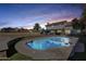 Sparkling pool with custom edging and plenty of space for lounging and enjoying the outdoors at 5915 E Fairfield St, Mesa, AZ 85205