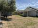 Backyard featuring a storage shed and various shade trees at 614 W 7Th Ave, Mesa, AZ 85210