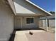 Front porch with security door provides a welcoming entry to the property, with desert landscaping at 614 W 7Th Ave, Mesa, AZ 85210