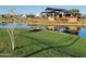 Picturesque community park featuring a covered pavilion overlooking a calm pond at 6225 S Boulder St, Gilbert, AZ 85298