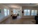 Inviting dining room featuring tile floors, plantation shutters, and an elegant chandelier at 6225 S Boulder St, Gilbert, AZ 85298