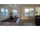 Bright dining space with modern light fixture, tile floors, and plantation shutters at 6225 S Boulder St, Gilbert, AZ 85298