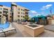 Resort-style pool area with comfortable lounge seating and cozy cabanas at 7300 E Earll Dr # 3016, Scottsdale, AZ 85251