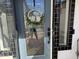 Close-up of the stylish front door with decorative glass and hardware, enhancing curb appeal at 7350 E Pueblo Ave, Mesa, AZ 85208