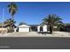 Charming single-story home with desert landscaping and a two-car garage at 7350 E Pueblo Ave, Mesa, AZ 85208