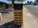 Unique wooden mailbox displaying the house number with street view at 7350 E Pueblo Ave, Mesa, AZ 85208