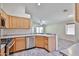 Bright kitchen featuring stainless steel appliances and an open design overlooking the living area at 7642 W Carlota Ln, Peoria, AZ 85383