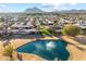 Aerial view showcasing beautiful landscaping, community features and mountain views at 7912 E Plaza Ave, Scottsdale, AZ 85250