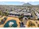 Aerial view showcasing the community, fountain and beautiful landscaping at 7912 E Plaza Ave, Scottsdale, AZ 85250