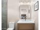 Bathroom featuring a wood vanity, white quartz countertop, and a framed mirror at 8315 N Sendero Tres M --, Paradise Valley, AZ 85253