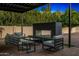 Inviting outdoor living space featuring a modern fireplace and comfortable seating, perfect for relaxation at 8315 N Sendero Tres M --, Paradise Valley, AZ 85253