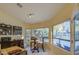 Bright breakfast nook with corner windows offers a view of the backyard and pool at 835 W Beechnut Dr, Chandler, AZ 85248