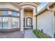 Welcoming front entrance with covered porch, desert landscaping, and charming exterior details at 835 W Beechnut Dr, Chandler, AZ 85248