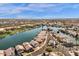 Stunning aerial view of lakeside homes with lush landscaping and community amenities at 9019 W Acoma Dr, Peoria, AZ 85381