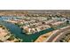 Aerial view of a waterfront community with private docks and lake access at 9019 W Acoma Dr, Peoria, AZ 85381