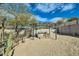 Backyard with a hot tub under a pergola, landscaping, and plenty of space for activities at 9031 N 14Th St, Phoenix, AZ 85020