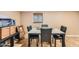 Dining room featuring a marble-topped table and sleek, modern chairs at 9031 N 14Th St, Phoenix, AZ 85020