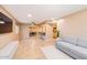 Bright living room with tile floors, neutral walls, and views into the dining and kitchen areas at 9031 N 14Th St, Phoenix, AZ 85020