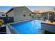 Enjoy this backyard with a beautiful sparkling pool and relaxing lounge areas at 9543 W Donald Dr, Peoria, AZ 85383