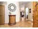 Inviting foyer with tile floors, decorative cabinet, and a view into the open living space at 10142 E La Palma Ave, Gold Canyon, AZ 85118