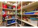 Organized walk-in pantry with shelving offers ample storage for food and kitchen essentials at 10142 E La Palma Ave, Gold Canyon, AZ 85118