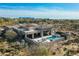 Expansive desert property with a private pool and spa, offering luxury living and scenic views at 10238 E Rising Sun Dr, Scottsdale, AZ 85262