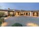 Charming home with a large driveway and a three car garage at 10238 E Rising Sun Dr, Scottsdale, AZ 85262