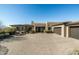 Charming home with a large driveway and a three car garage at 10238 E Rising Sun Dr, Scottsdale, AZ 85262