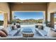 Inviting outdoor patio with comfortable seating, perfect for enjoying the desert views and serene environment at 10238 E Rising Sun Dr, Scottsdale, AZ 85262