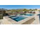 Relaxing pool and spa area with lounge chairs and desert views, creating a perfect outdoor retreat at 10238 E Rising Sun Dr, Scottsdale, AZ 85262