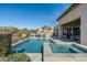 Beautiful backyard with a large pool and spa, perfect for outdoor entertaining and relaxation at 10238 E Rising Sun Dr, Scottsdale, AZ 85262