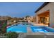Beautiful backyard with a large pool and spa, perfect for outdoor entertaining and relaxation at 10238 E Rising Sun Dr, Scottsdale, AZ 85262